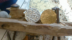 Coins from the Halsewell on display.